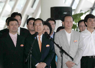 Chen Yunlin (R), director of the Taiwan Work Office of the Communist Party of China (CPC) Central Committee, greets James Soong, Chairman of the People First Party (PFP) in Taiwan, upon his arrival at Pudong airport of Shanghai, Sept. 14, 2005. Soong left Taipei for the Chinese mainland city Shanghai Wednesday morning to attend the first session of a non-governmental forum of elites from both sides of the Taiwan Strait.