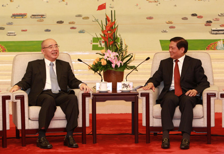 Liu Qi (R), member of the Political Bureau of the Central Committee of the Communist Party of China (CPC) and chief of the CPC Beijing Municipal Committee, meets with Kuomintang (KMT) Chairman Wu Poh-hsiung in Beijing, capital of China, on May 26, 2009.