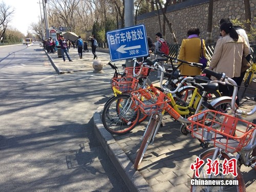 共用單車越來越多，出現在大街小巷。<a target='_blank' href='http://big5.chinataiwan.cn/gate/big5/www.chinanews.com/' _fcksavedurl='http://big5.chinataiwan.cn/gate/big5/www.chinanews.com/' ></table><p  align=