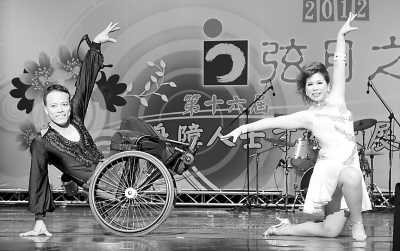臺灣殘障人的勵志故事:沒有翅膀一樣可以飛翔（圖）